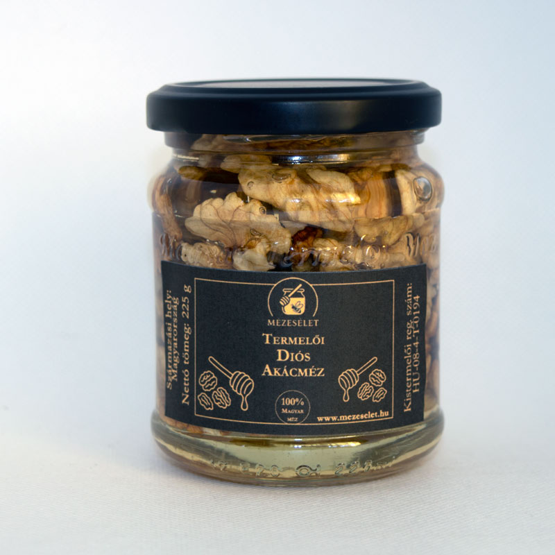 dios-akacmez-225gramm Diós akácméz – termelői méz diódarabokkal, elegáns fekete kupakos üvegben.