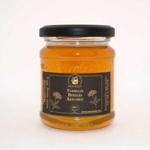 Bodzás akácméz különlegesség 250 g üvegben, fekete címkével elegáns aranybarna motívumokkal díszítve, termelői méz.