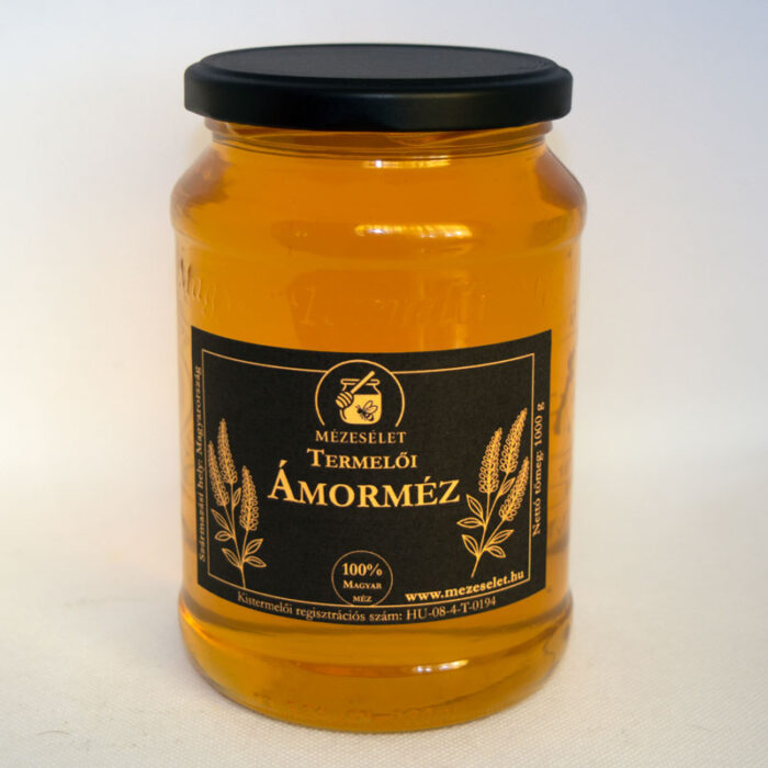 Ámorméz 100 grammos üvegben halványbarna méz fekete címkével is tetővel.