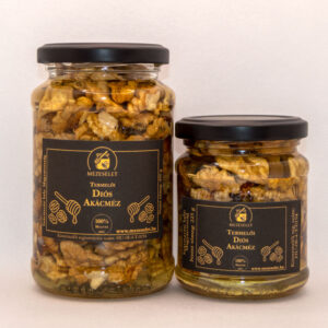 Diós mézek 450 g és 225 g üvegekben, fekete dizájnos címkével és kupakkal.