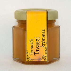 Mini üveges tavaszi krémméz, barna színű méz díszüvegben.